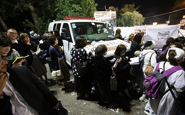 The faithful pray on Mount Meron on May 26, 2016as an ambulance stands by (Courtesy Magen David Adom)