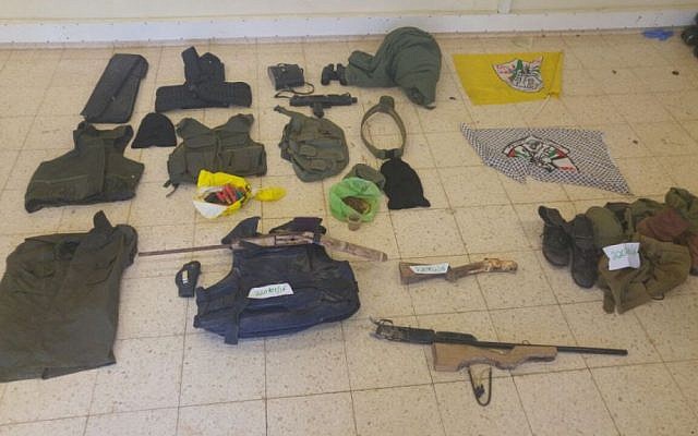 Homemade guns, body armor and other equipment seized by IDF troops in the Palestinian village of al-Dik in an overnight raid on May 25, 2016. (IDF Spokesperson's Unit)