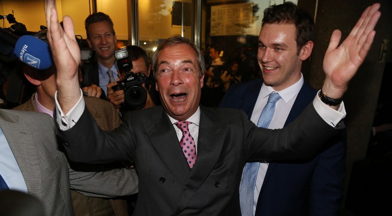 Leader of the United Kingdom Independence Party (UKIP), Nigel Farage reacts outside the Leave.EU referendum party at Millbank Tower in central London on June 24, 2016, as Brexit results came in. (EU). (AFP PHOTO / GEOFF CADDICK)