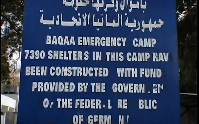Sign at the entrance to the Baqaa refugee camp in Jordan. (YouTube/StonyRunProductions)
