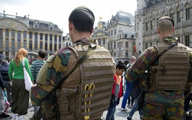 Belgian Army soldiers patrol in the historic Grand Place in Brussels on Sunday, June 19, 2016. (AP Photo/Virginia Mayo)