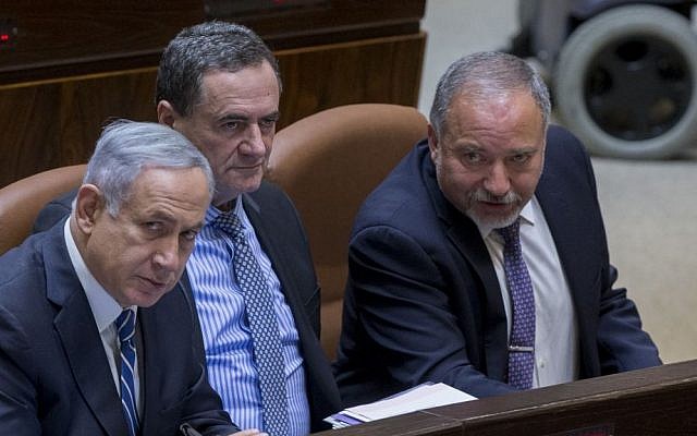 Prime Minister Benjamin Netanyahu, left,  Transportation Minister Yisrael Katz, center, and Defense Minister Avigdor Liberman in the Knesset, Jerusalem May 30, 2016. (Yonatan Sindel/Flash90) 