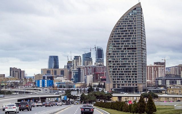 In this Feb. 19, 2016, file photo, The Trump International Hotel, the highest building, is seen in Baku, Azerbaijan. (AP Photo/Aida Sultanova, File)
