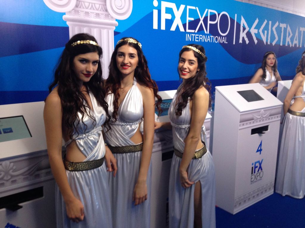 Models in Greek-themed costume greet conference attendees at the IFX Expo Cyprus conference, May 2016 (Hunter Stuart)