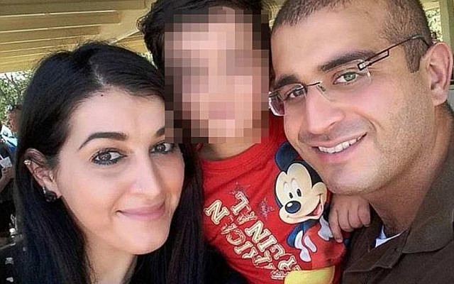 Orlando gunman Omar Mateen (R) with his wife, Noor Zahi Salman and son. (Screen capture: YouTube)