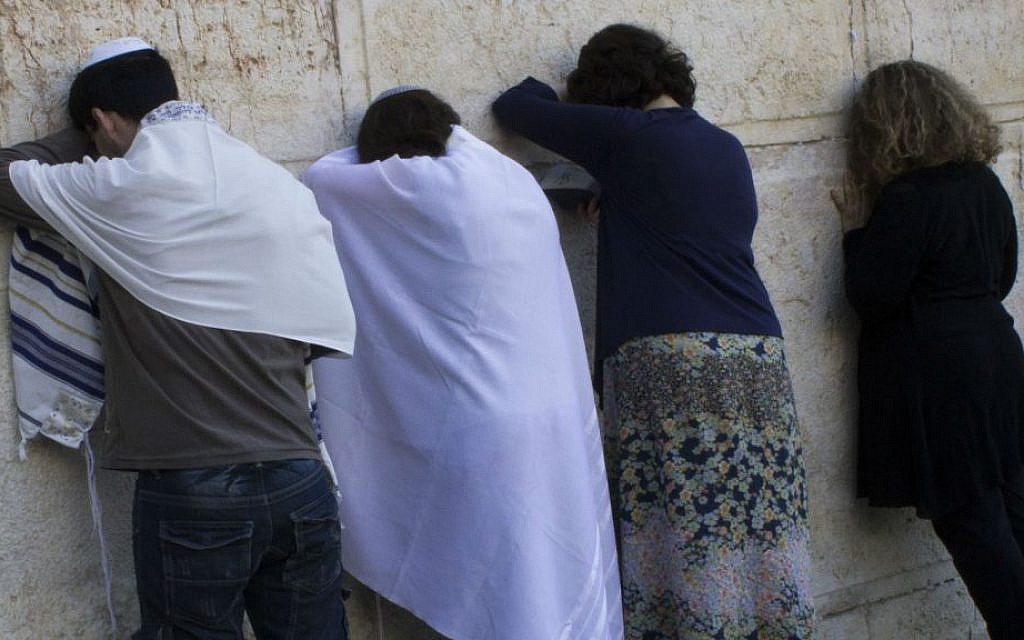 Conservative Jews pray at the temporary egalitarian Robinson's Arch prayer pavilion at the southern end of the Western Wall in Jerusalem's Old City on July 30, 2014.  (Robert Swift/Flash90)