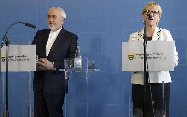 Iran's Foreign Minister Mohammad Javad Zarif, left, looks on during a joint press conference with his Swedish counterpart Margot Wallstrom, at the Ministry for Foreign Affairs in Stockholm, June 1, 2016. (Maja Suslin/TT News Agency via AP)