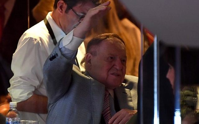 Sheldon Adelson gestures on the sidelines of the Republican National Convention at the Quicken Loans Arena in Cleveland, Ohio on July 21, 2016. (AFP PHOTO / JIM WATSON)