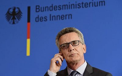 German Interior Minister Thomas de Maiziere addresses the press on the attacks in Reutlingen and Ansbach in Berlin, on July 25, 2016. (AFP/Tobias Schwarz)