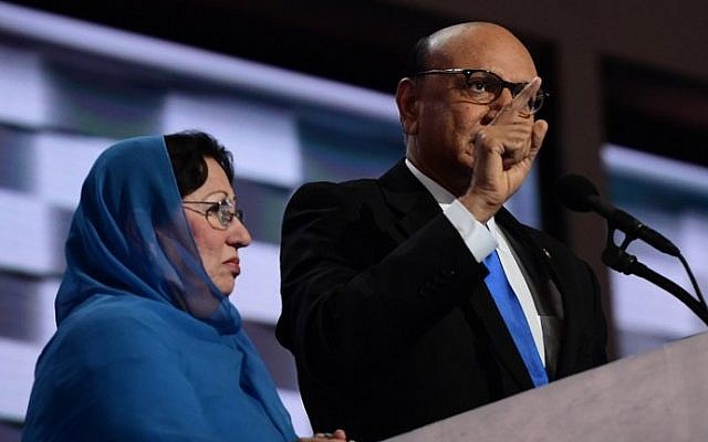 Khizr Khan, right, accompanied by his wife Ghazala Khan, speaks about their son US Army Captain Humayun Khan who was killed by a suicide bomber in Iraq 12 years ago, on the final night of the Democratic National Convention at the Wells Fargo Center, July 28, 2016 in Philadelphia, Pennsylvania. (AFP/Robyn Beck)