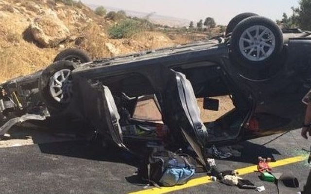 An Israeli car hit in a drive-by shooting near Hebron that killed one person and injured three on July 1, 2016. (Judea and Samaria Fire Department)