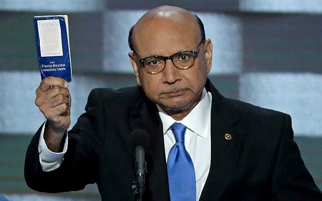 PHILADELPHIA, PA - JULY 28: Khizr Khan, father of deceased Muslim US soldier, holds up a booklet of the US Constitution as he delivers remarks on the fourth day of the Democratic National Convention at the Wells Fargo Center, July 28, 2016 in Philadelphia, Pennsylvania. Alex Wong/Getty Images/AFP