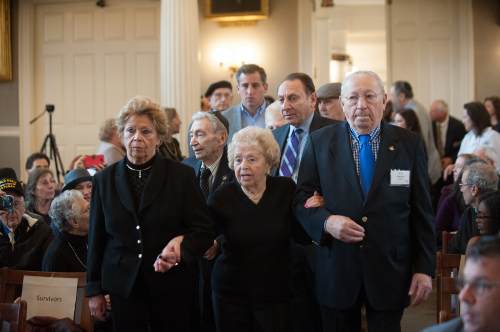 Holocaust survivor Israel Arbeiter, a long-time leader in the community (right) with his wife, Anna Arbeiter (center), participating in the 2016 Yom HaShoah commemoration in Boston, Massachusetts, organized by the Jewish Community Relations Council of Greater Boston (courtesy)
