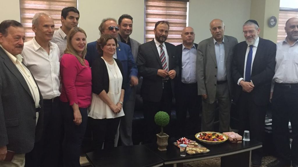 Former Saudi general Dr. Anwar Eshki (center, in striped tie) and other members of his delegation, meeting with Knesset members and others during a visit to Israel on July 22, 2016 (via Twitter)
