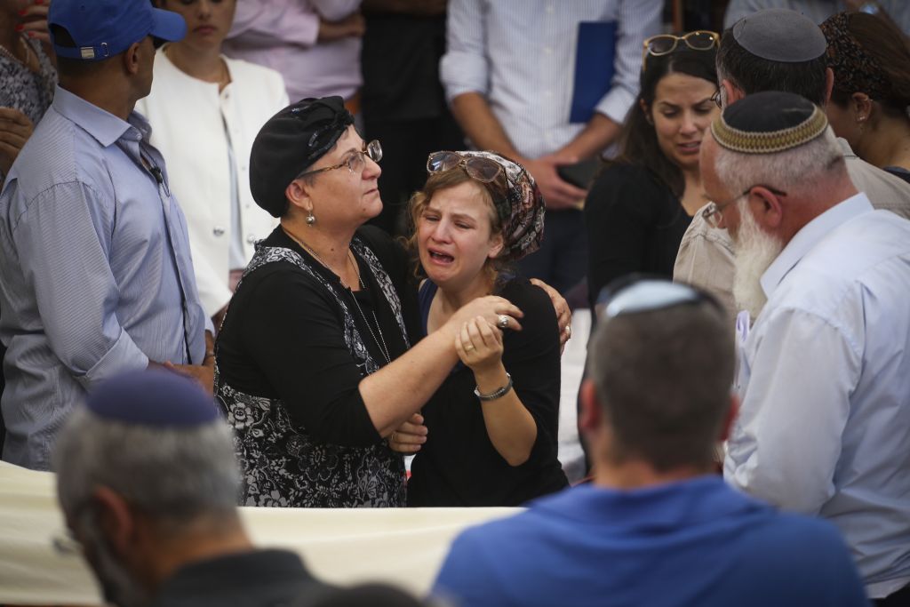 President, thousands mourn 'righteous' rabbi slain in terror attack ...