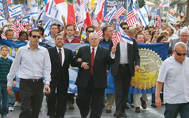 File: Pastor John Hagee, center, leads Christians in a solidarity march in Jerusalem in 2010. (Courtesy: CUFI)