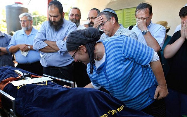 Rina, the mother of 13-year-old Hallel Yaffa Ariel, who was fatally stabbed by a Palestinian terrorist in her home, mourns during her funeral in the Kiryat Arba settlement outside the West Bank city of Hebron, June 30, 2016. (Gil Cohen-Magen/AFP/Getty Images via JTA)
