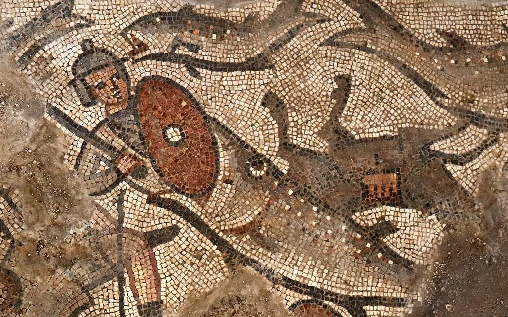 A fish swallows an Egyptian soldier in a mosaic scene depicting the splitting of the Red Sea from the Exodus story, from the 5th-century synagogue at Huqoq, in northern Israel. (Jim Haberman/University of North Carolina Chapel Hill)