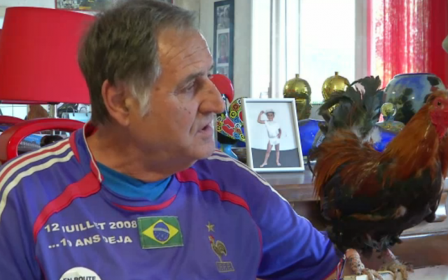 Balthazar the rooster and his owner (AFP screenshot)