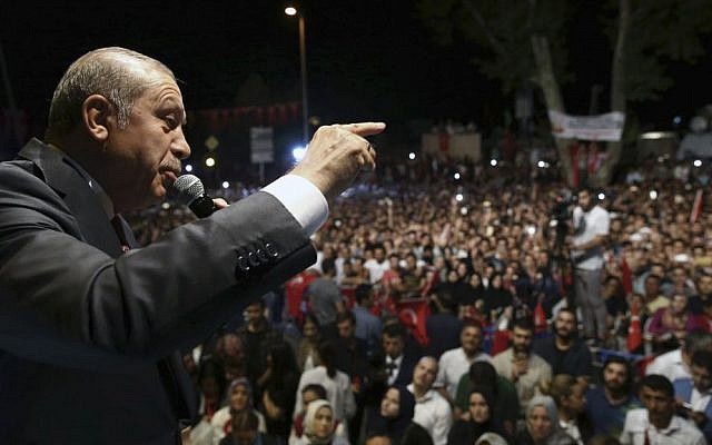 Turkey's President Recep Tayyip Erdogan addresses his supporters gathered in front of his residence in Istanbul, early Tuesday, July 19, 2016. (Kayhan Ozer/pool photo via AP)
