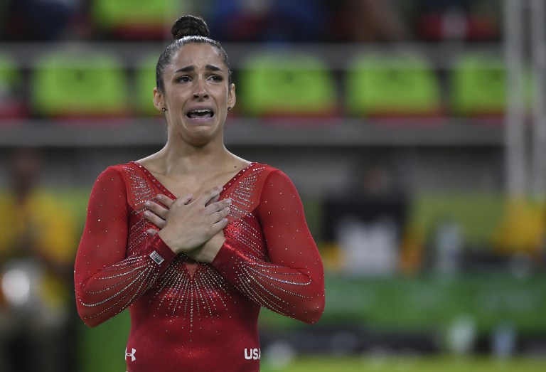 US gymnast Alexandra Raisman reacts after competing in the floor event of the women's individual all-around final of the Artistic Gymnastics at the Olympic Arena during the Rio 2016 Olympic Games in Rio de Janeiro on August 11, 2016. (AFP PHOTO / Ben STANSALL)