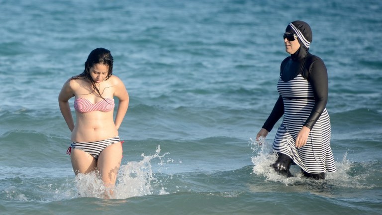French towns ban Muslim women's beach 'burkini