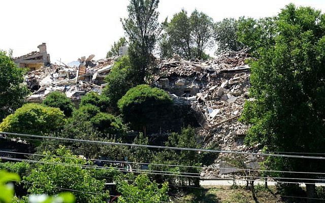 An August 26, 2016 picture shows rubble and debris of destroyed house in the damaged village of Saletta, three days after a 6.2-magnitude earthquake struck the region killing  some 281 people. (AFP Photo/Mario Laporta)