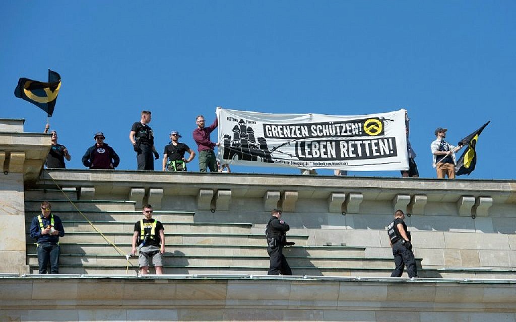 Anti Islam Activists Protest Atop Berlin S Brandenburg Gate The Times Of Israel