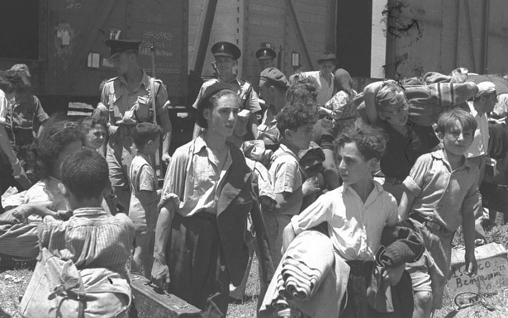Children rescued from Nazi concentration camps in Europe arrive at the Atlit detention camp near Haifa in 1945. (GPO)