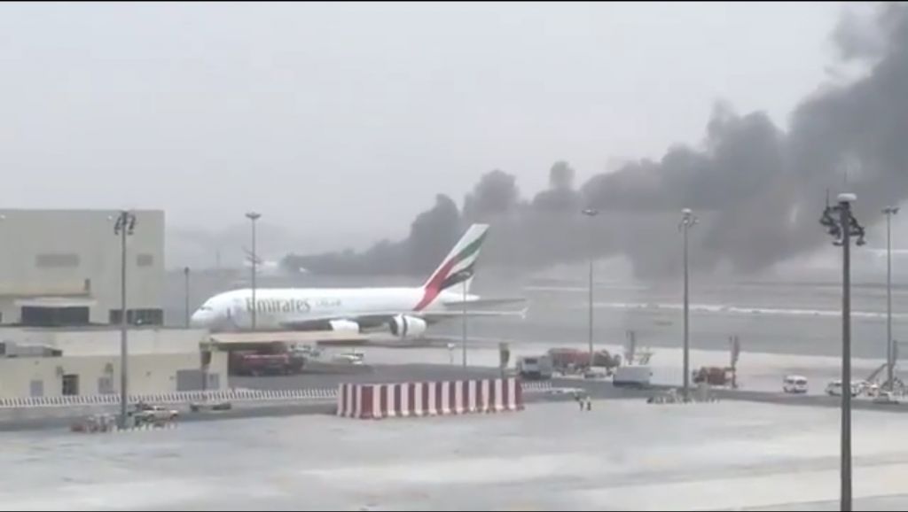 Plane engulfed in smoke in Dubai airport landing accident