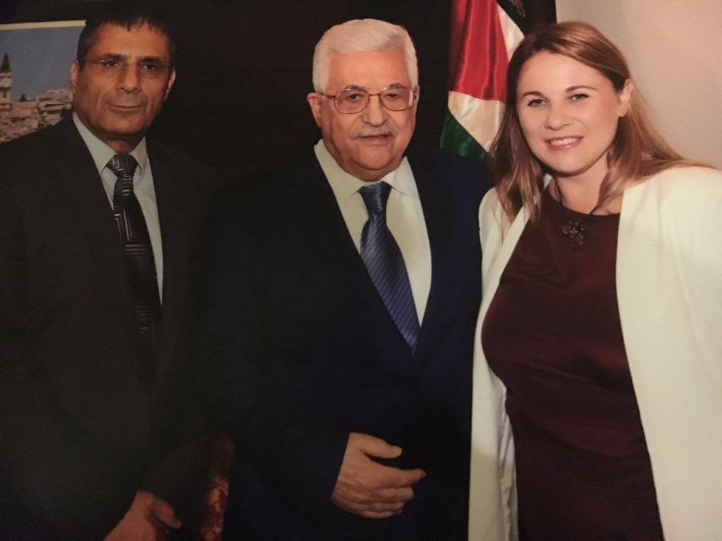 Palestinian President Abu Mazen is flanked by Zionist Union MKs Ksenia Svetlova (right) and Yossi Yona in a photo taken during an August 2016 visit to Ramallah. (Facebook)