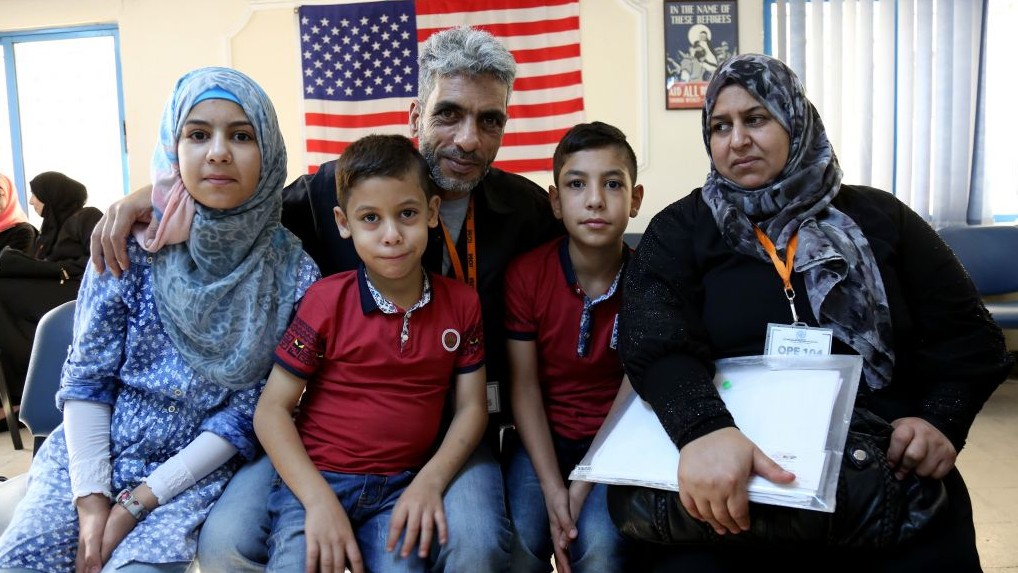 Five members of the Jouriyeh family, Syrian refugees headed to the US as part of a resettlement program. (AP Photo/Raad Adayleh)