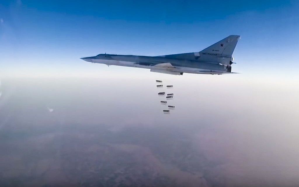 A Russian long range bomber Tu-22M3 flies during a strike above an undisclosed location in Syria on Sunday, Aug. 14, 2015. (Russian Defense Ministry press service photo via AP)
