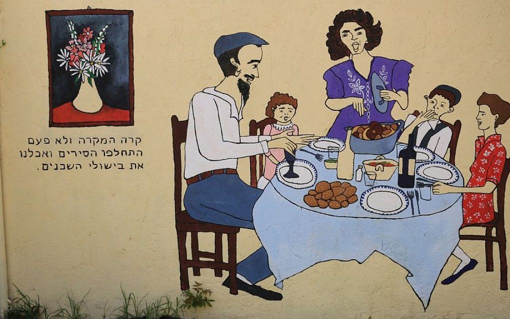 A mural depicting a communal dinner in the market neighborhood of Ohel Moshe. (Shmuel Bar-Am)