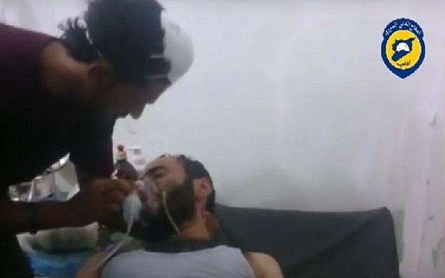 A man being treated at hospital after a suspected chemical weapons attack in Idlib province in Syria, August 1, 2016. (Screenshot/YouTube)