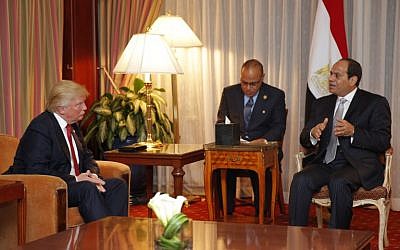 Then-Republican presidential candidate Donald Trump looks on as Egyptian President Abdel Fattah el-Sissi speaks during a meeting at the Plaza Hotel on September 19, 2016 in New York. (AFP/Dominick Reuter)