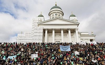 Participants demonstrate against racism and fascism in Helsinki, Finland, on September 24, 2016. AFP/Lehtikuva/Roni Rekomaa)