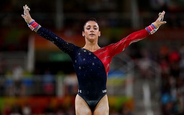 Aly Raisman competing on the uneven bars at the Rio Olympic Games, August 7, 2016. (Tom Pennington/Getty Images/JTA)