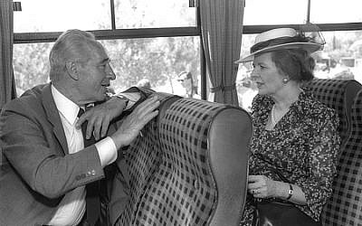 During an official state visit to Israel in 1986, prime minister Shimon Peres and British prime minister Margaret Thatcher chat during a bus drive in teh Negev. (Herman Chanania/GPO)