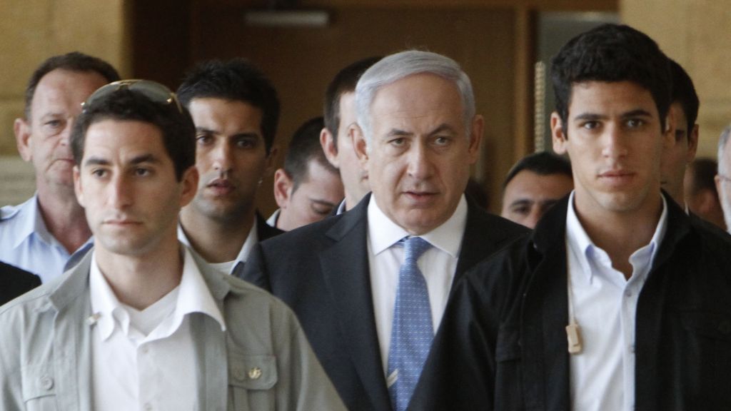 Illustrative: Prime Minister Benjamin Netanyahu flanked by security guards (Miriam Alster/Flash90)