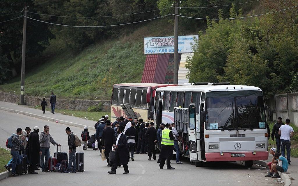 Ultra-Orthodox Jewish pilgrims load buses in Uman, Ukraine, on September 8, 2013. (Yaakov Naumi/Flash90)
