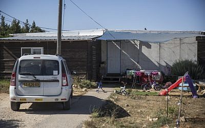 View of a street and caravan homes at the Amona Jewish outpost in the West Bank, on July 28, 2016. (Hadas Parush/FLASH90)