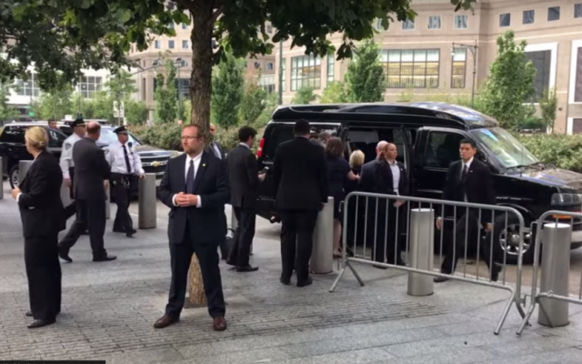 Democratic nominee Hillary Clinton is helped to her van as she leaves Ground Zero on September 11, 2016 (screen capture: YouTube)