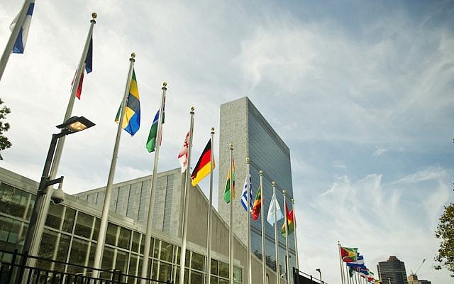 Flags of member nations flying in front of United Nations headquarters in New York, September 25, 2015. (Michael Gottschalk/Photothek via Getty Images)