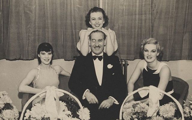 1936 photo of Sir Victor Sassoon and three dancers who appeared at his Shanghai nightclub, Ciro's. (Courtesy)
