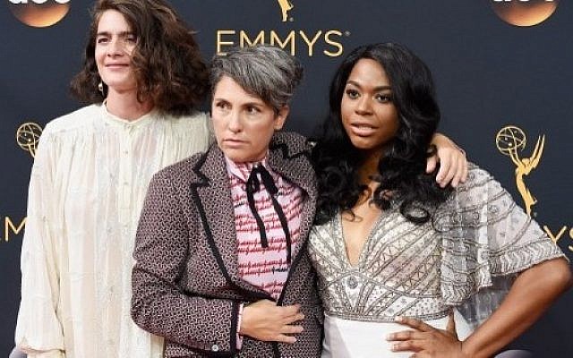 Actress Gaby Hoffmann (left), writer/director Jill Soloway (center) and actress Alexandra Grey (right) attend the 68th Annual Primetime Emmy Awards on in Los Angeles, California, on September 18, 2016. (Frazer Harrison/Getty Images/AFP)