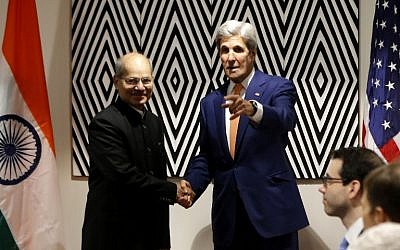 US Secretary of State John Kerry (R) shakes hands with Indian Minister of State for Environment, Forest and Climate Change, Shri Anil Madhav Dave before a bilateral meeting on the sidelines of the 28th Meeting of the Parties to the Montreal Protocol on October 14 2016. (AFP PHOTO/CYRIL NDEGEYA)