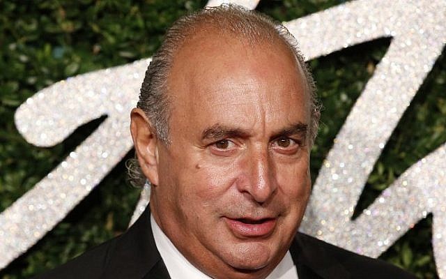 British businessman Philip Green posing on the red carpet to attend the British Fashion Awards in London, December 01, 2014. (AFP PHOTO / JUSTIN TALLIS)