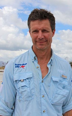 Dr. Ian Norton, from the World Health Organization, takes part in Australia's disaster relief effort in The Philippines after a typhoon wreaked havoc on the island nation in 2013. (Gemma Haines/ Australian Department of Foreign Affairs and Trade/Wikimedia)