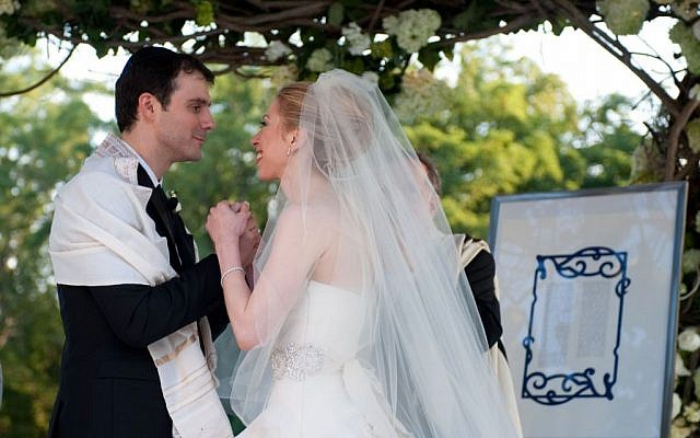 Marc Mezvinsky and Chelsea Clinton combined Jewish and Methodist traditions during their wedding ceremony on July 31, 2010. (Genevieve de Manio, via JTA)